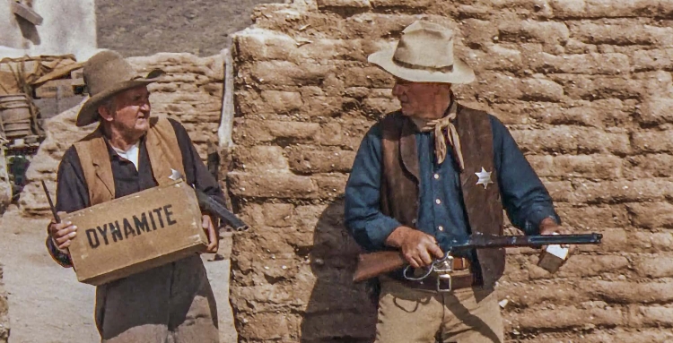 John Wayne e il suo Winchester 1892, nel film "Un Dollaro d'Onore" (Rio Bravo) del 1959