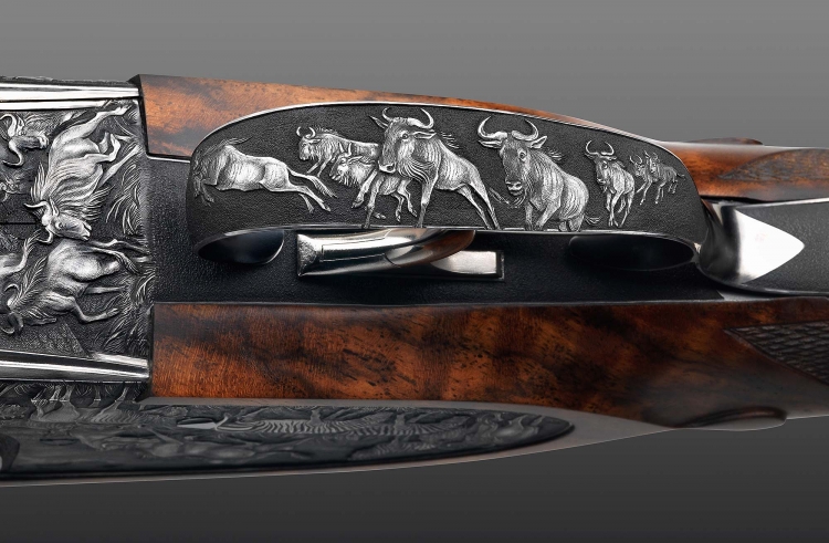 Johann Fanzoj: "The Great Migration" Express Rifle Fanzoj "The Great Migration" Express Rifle: detail of the engraving on the trigger guard