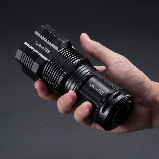 The massive, yet short Nitecore TM28 is a handy searchlight using four powerful LEDs to boast a blinding 6.000 lumen output