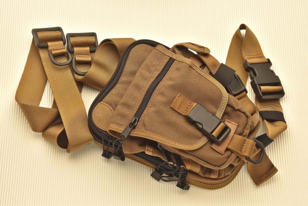 The Radar 5115-2801 shoulder bag features an integrated holster, magazine pockets and lots of room for anything else!