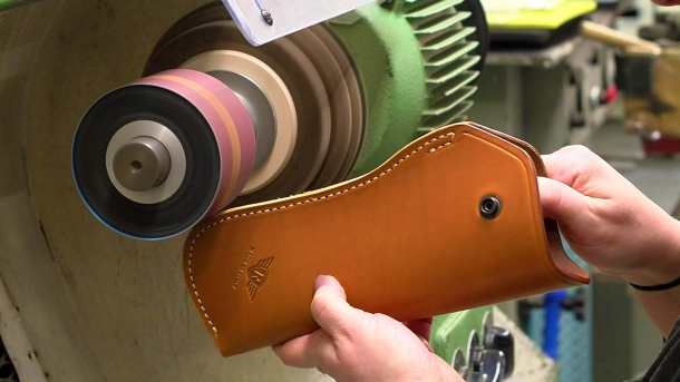 A leather holster being finished: RADAR has been manufacturing pistol holsters ever since the 1970s
