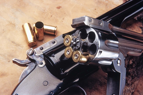 The top break design made unloading and reloading much easier and faster than closed frame, fixed cylinder revolvers of the same period