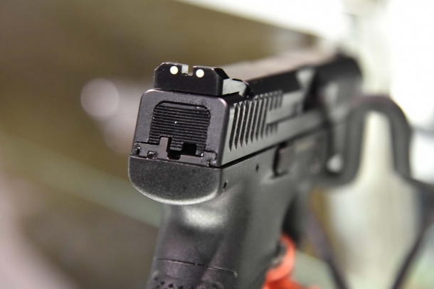 The striker-fired CZ P10C comes with three-dot dovetailed sights