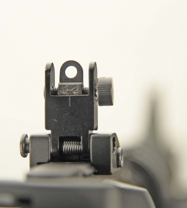 The Colt original flip-up adjustable rear sight (here with the large hole set)