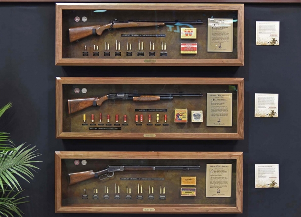 From The Cody Museum: a Winchester model 70, a Model 12 shotgun, and a Winchester model 1894 rifle