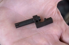 The Otis Technology AR Vent Hole Scraper, a practical tool for an easy cleaning of foulings and carbon build-up from the vent hole in the gas tube area of MSR/AR style rifles
